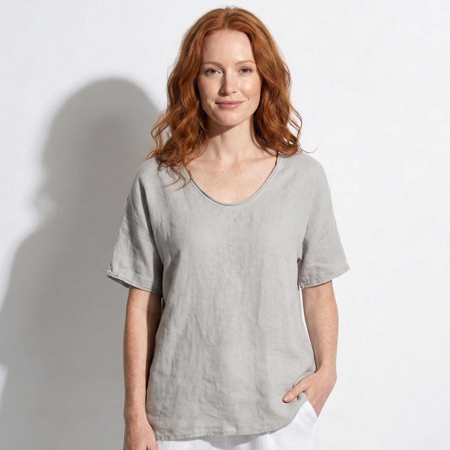 Women's blouse with V-neck and short sleeves