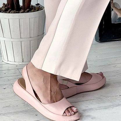 Women's sandals with flat sole and strap design