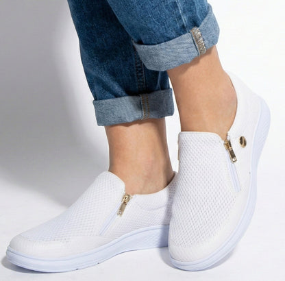 Women's sneakers with zipper and textured surface