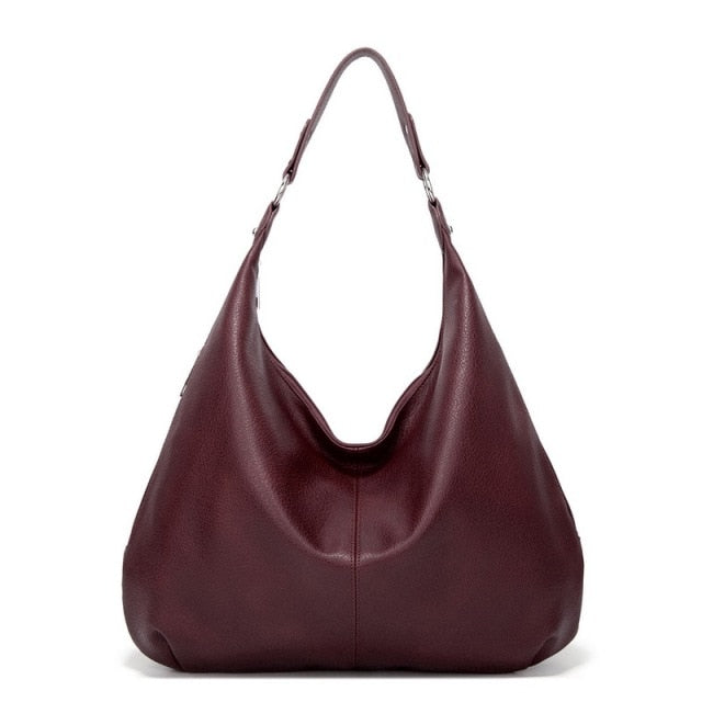 Women's handbag with classic shape and interior pockets