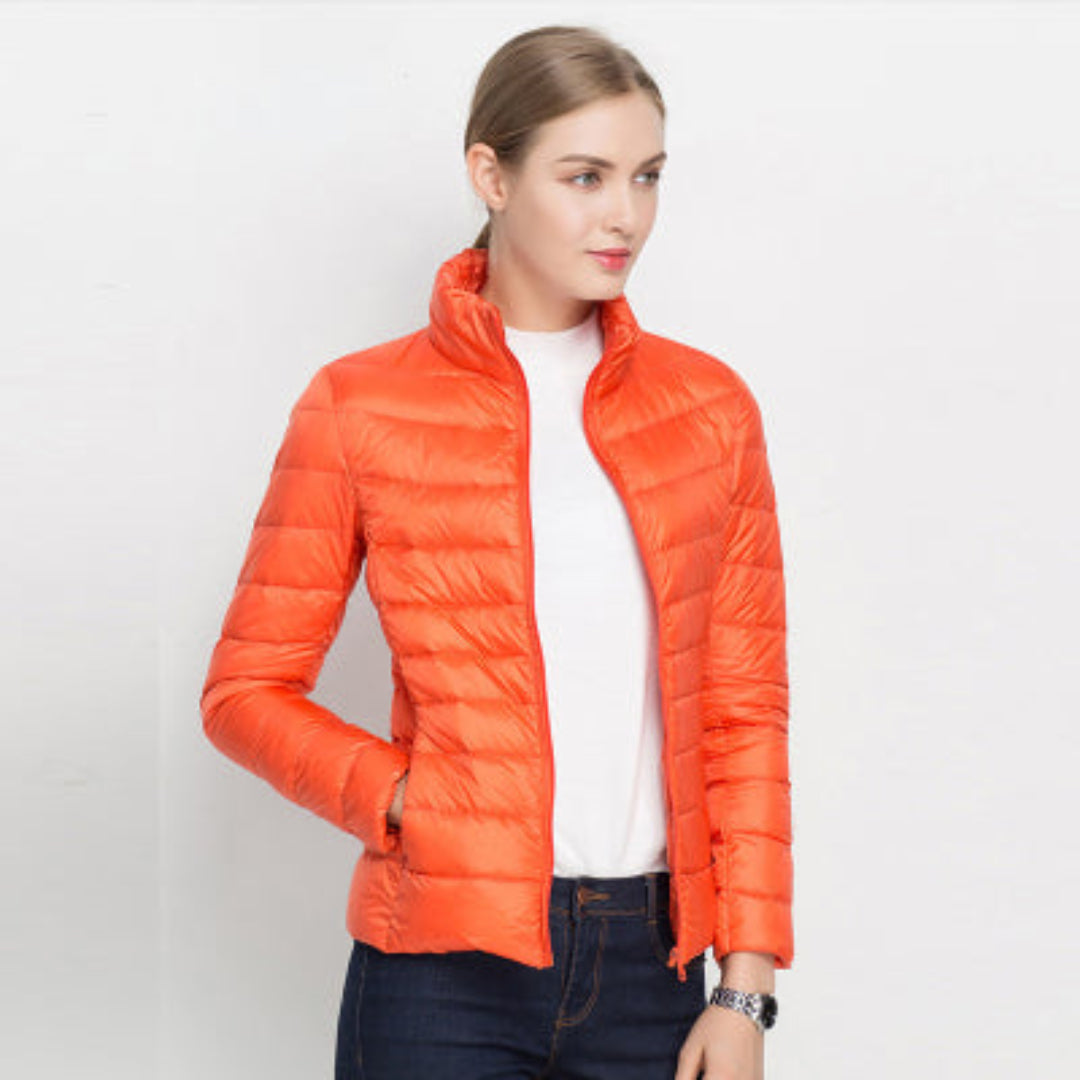 Women's quilted jacket with long sleeves and zipper