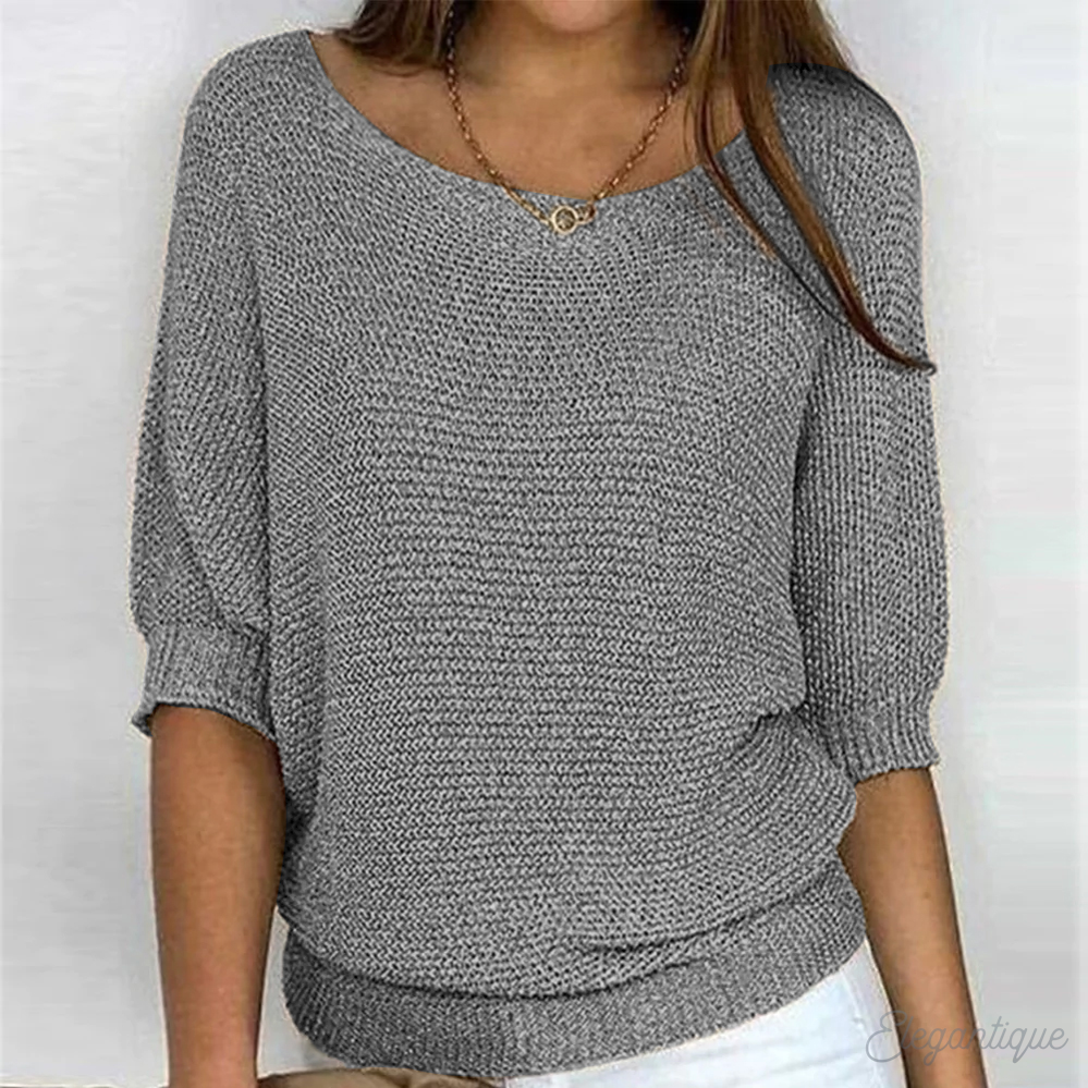 Women's knitted sweater with wide boat neckline and 3/4 sleeves