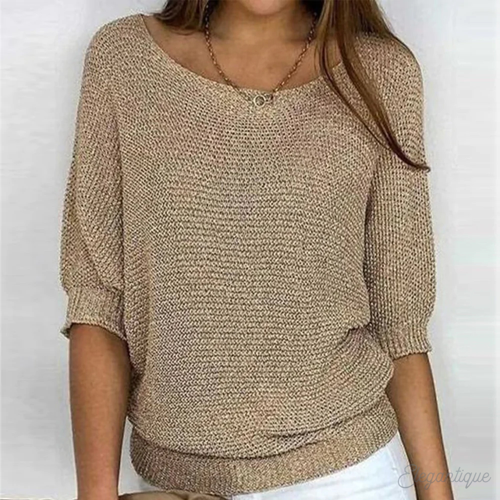 Women's knitted sweater with wide boat neckline and 3/4 sleeves